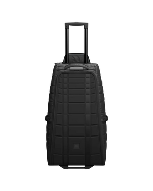 DB HUGGER ROLLER BAG 60L BLACK OUT - The Journey Store